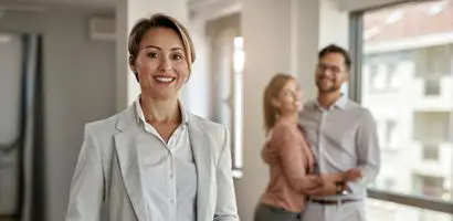 Nefra Properties consultant with clients in a modern office