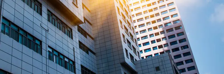 Property sales consultation with keys and handshake